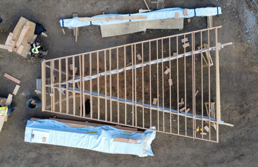 Construction of roof panel at Northern Lights College Cultural Arbour