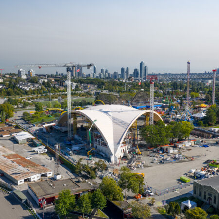 Full project aerial shot of construction at the PNE Freedom Mobile Arch with CLT decking on
