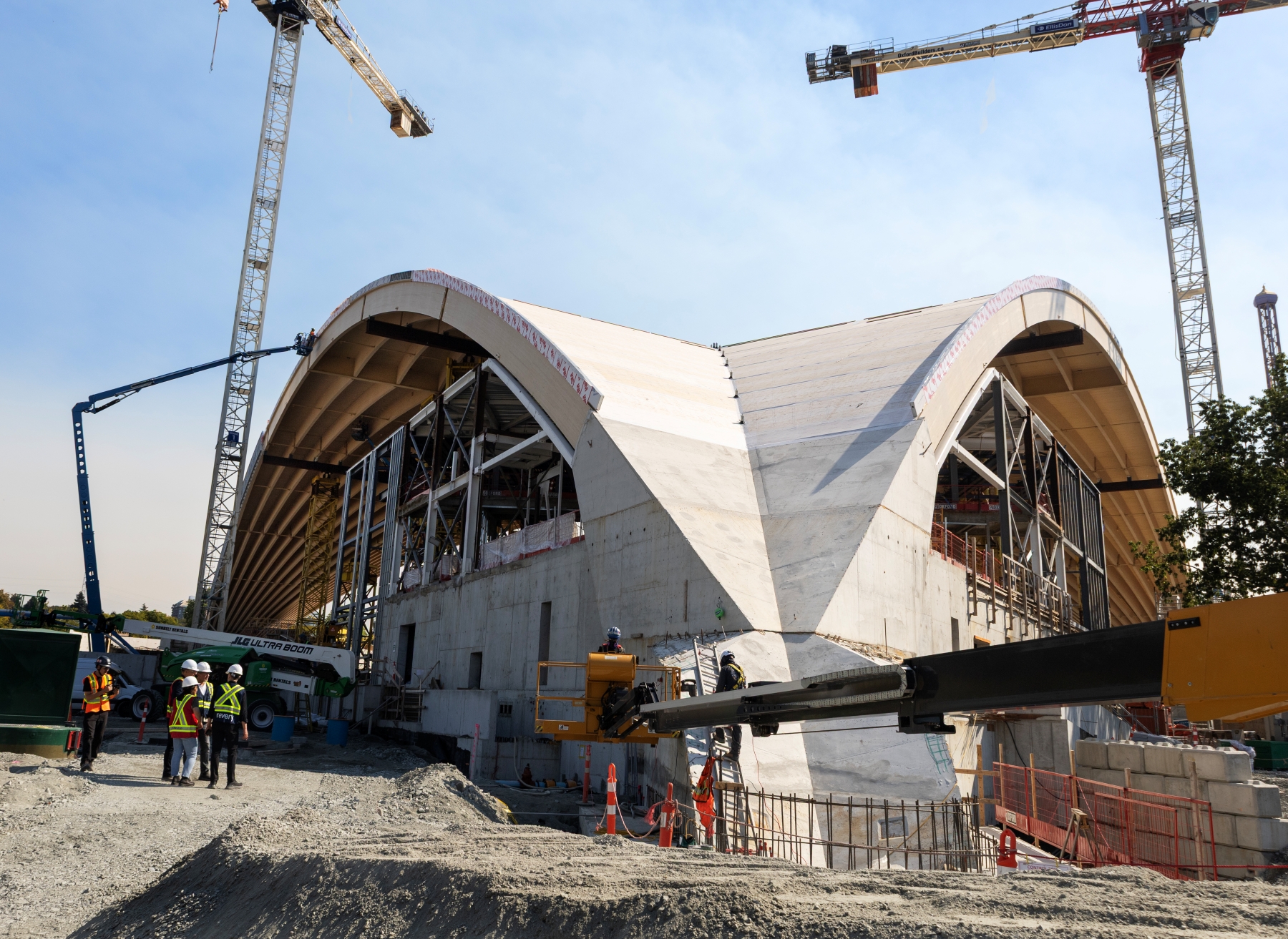Full project shot of construction at the PNE Freedom Mobile Arch with CLT decking on