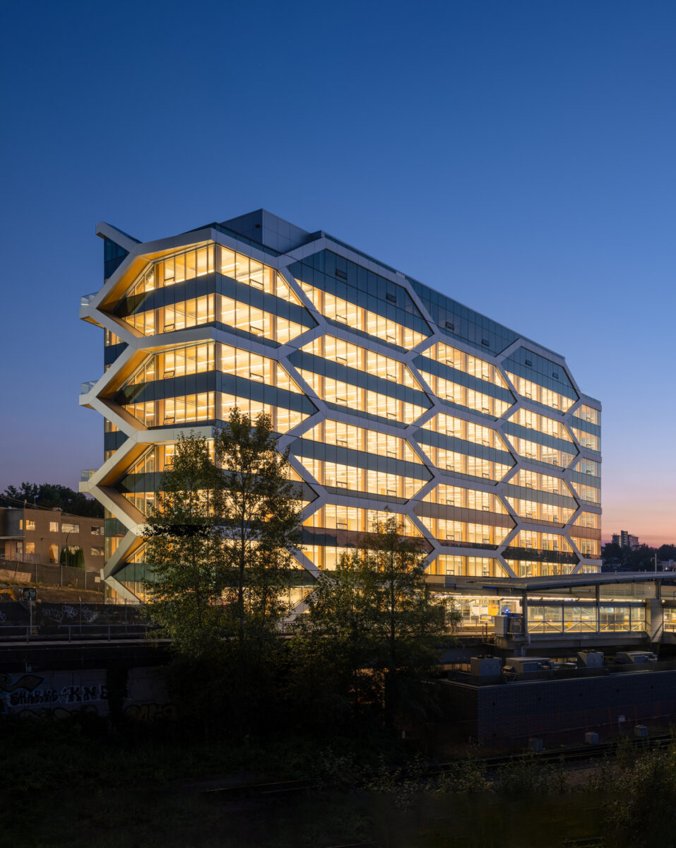 The Hive, Completed Exterior image at duck with the interior lights on and shining through the honeycomb facade