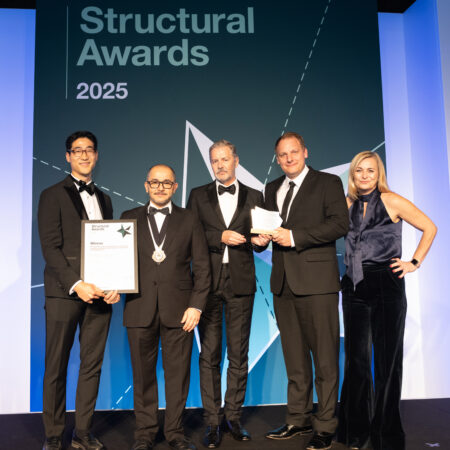 Fast + Epp Partner Robert Jackson, and guest Steve Jeon accept the iStructE Award for Limberlost Place at the awards gala in London