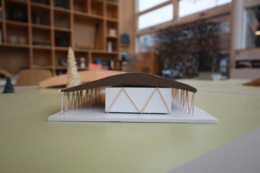 Workshop pavilion concept models displaying creative forms inspired by future and bio-based materials.