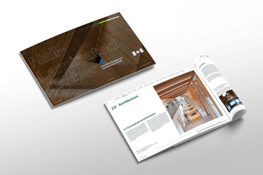 Flat lay of the Nail-Laminated Timber Canadian Design and Construction Guide 2.0 showing two books side by side, with one closed showing the cover page, and one flipped open to a project.